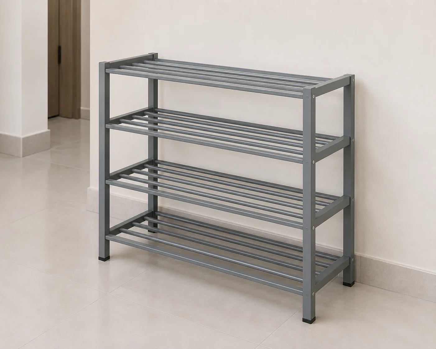 Multi-tier steel shoe rack outside a labour accommodation room